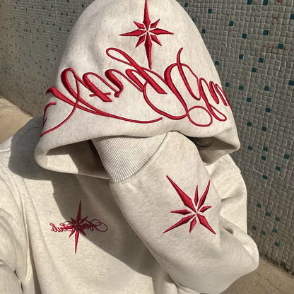 Sudadera bordada con capucha y manga larga