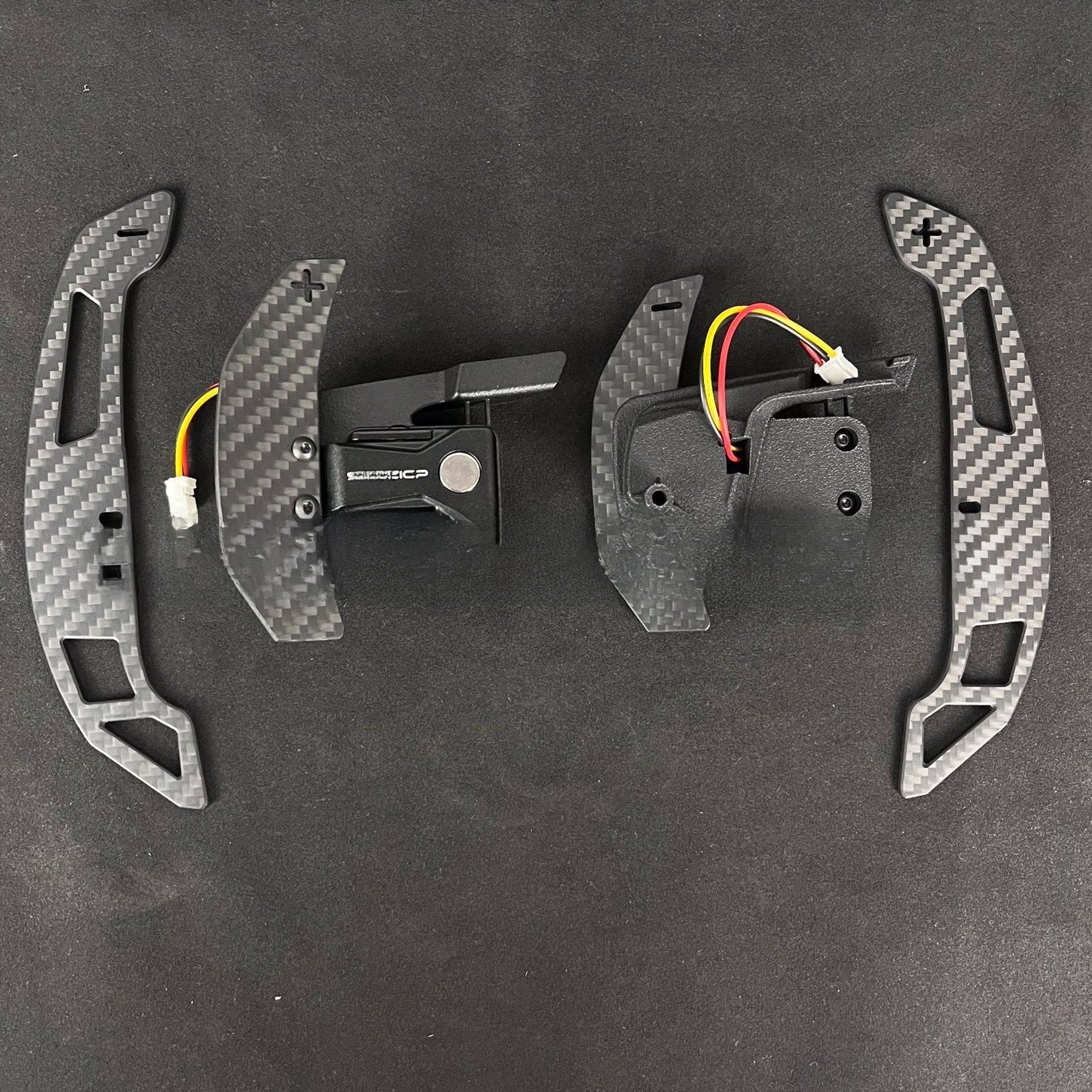 Levas de cambio magn�ticas de fibra de carbono
