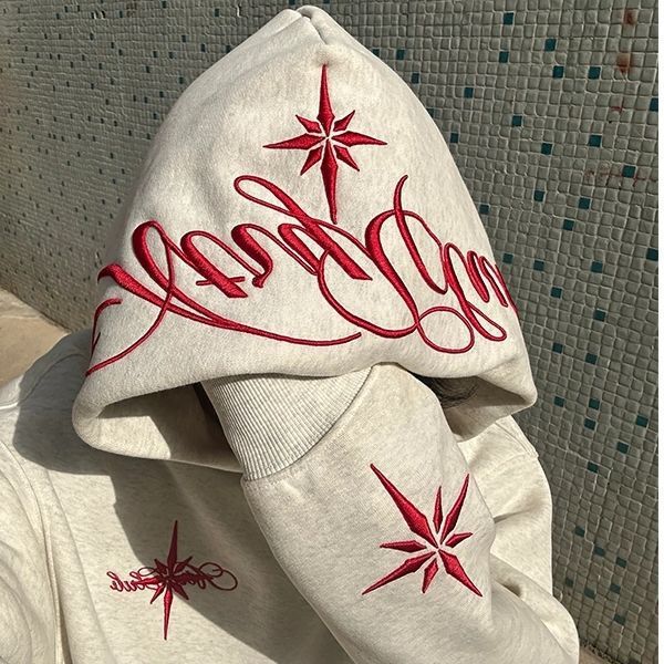 Sudadera bordada con capucha y manga larga